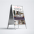 Outdoor advertising stand with customizable digital display on a white background